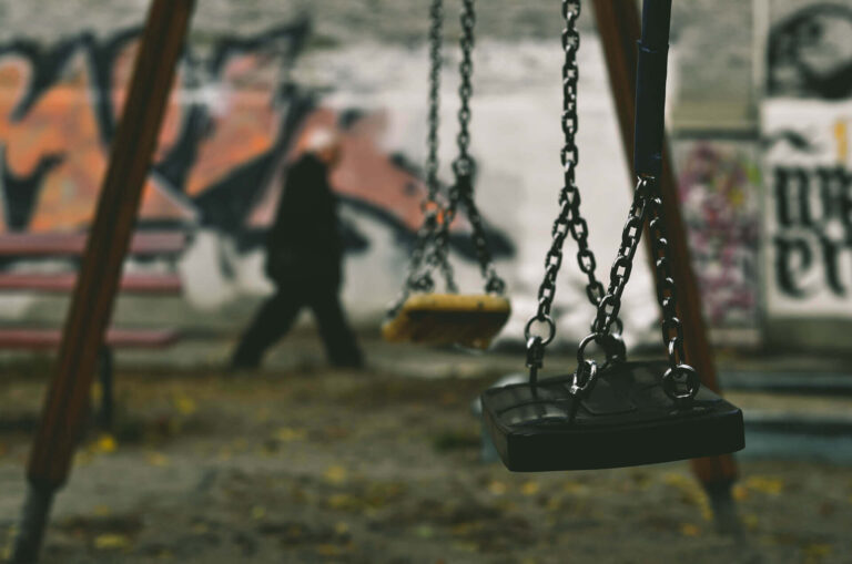 a swing set in a playground