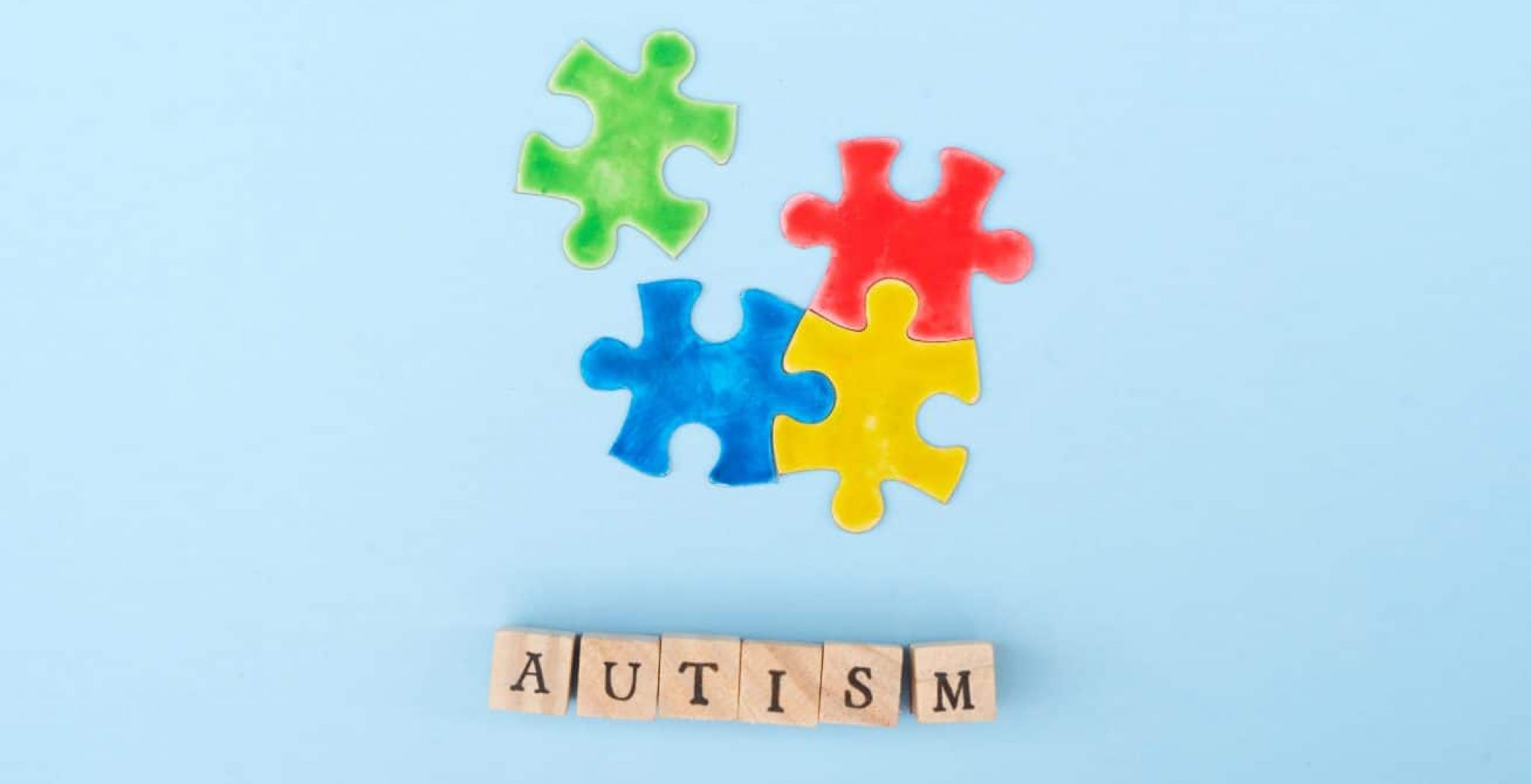 Autism spelled out with puzzle piece.